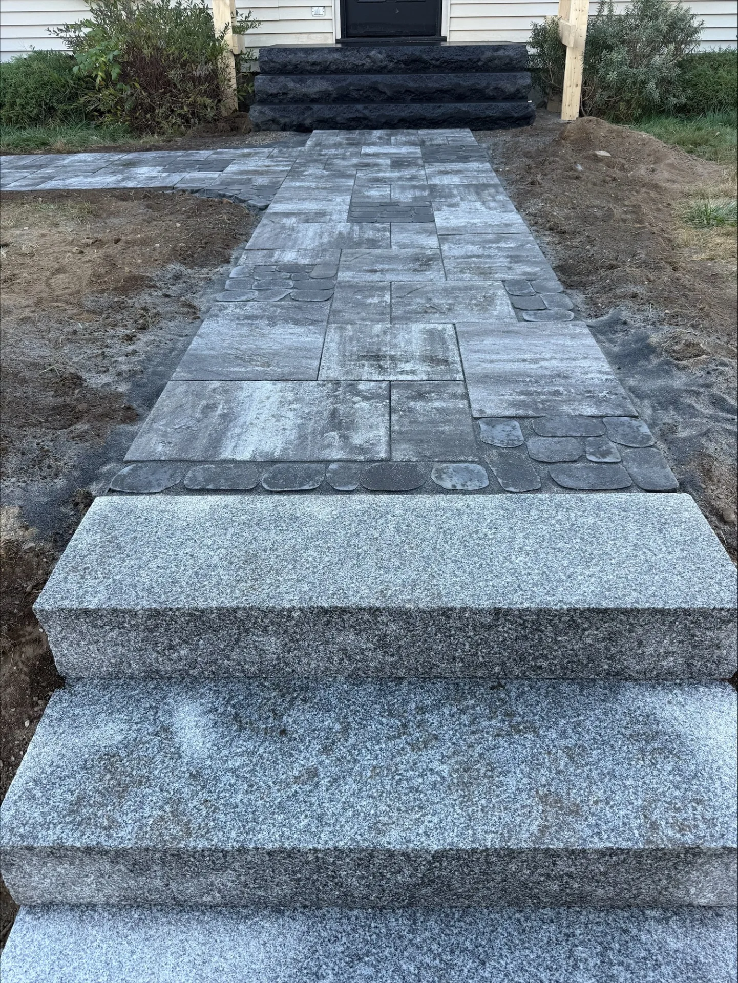 Granite steps and paver walkway from above